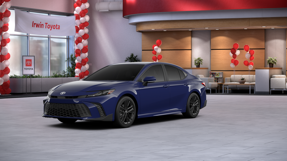 2026 Toyota Camry SE in Reservoir Blue — front three-quarter view