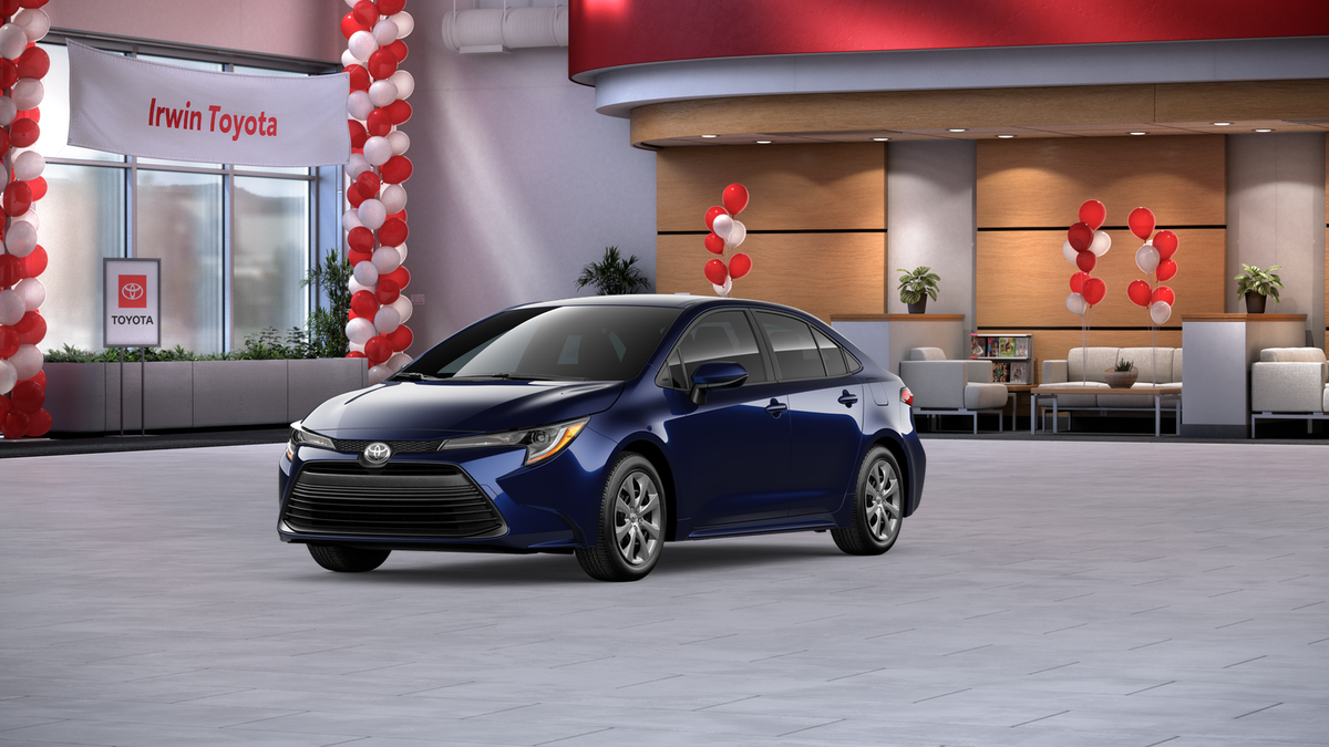 2026 Toyota Corolla LE in Blueprint — front three-quarter view